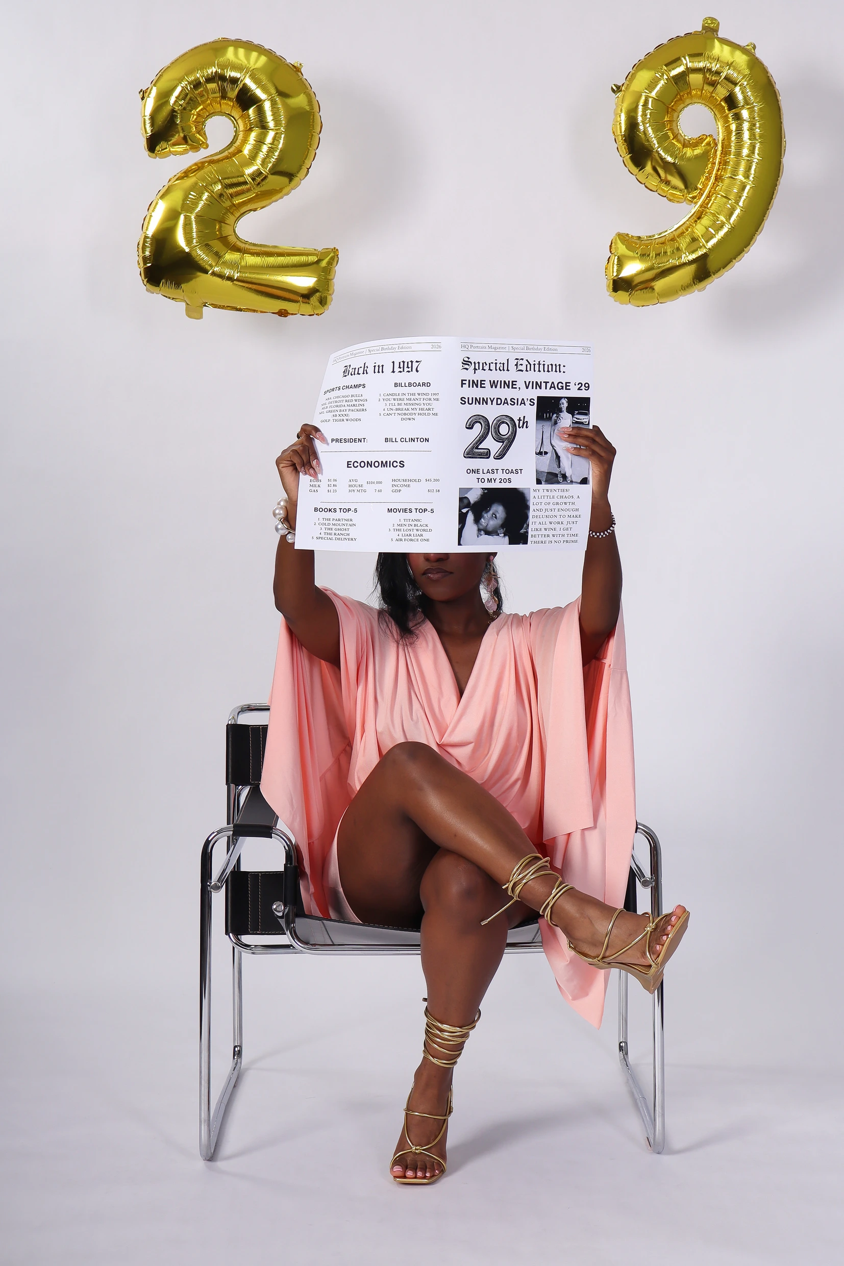 Birthday portrait with a custom newspaper prop