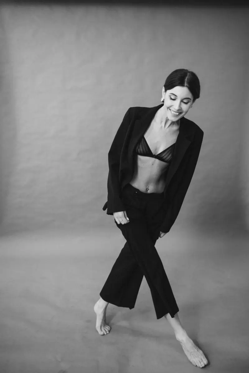 Inspiring self-portrait photography session at HQ Portraits Charlotte - person in stylish black outfit demonstrating creative posing and professional lighting techniques