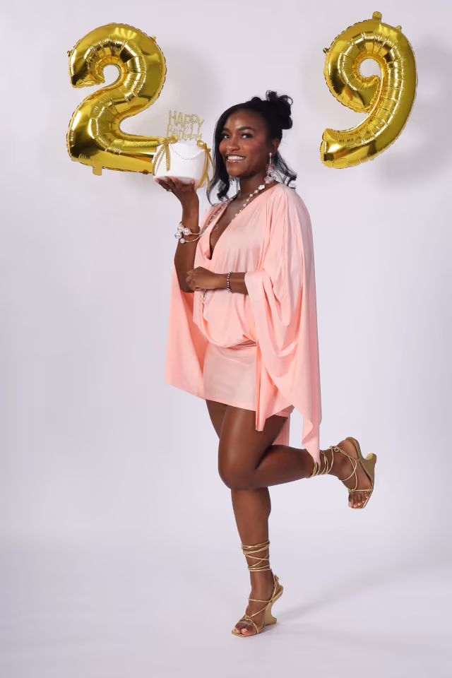 Share-ready vertical birthday portrait with cake styling and gold balloons